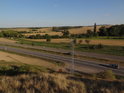 Pohled z chráněného území Člupy na údolí Litavy se silnicí I/50 a železniční tratí Brno – Veselí nad Moravou.