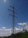 Ocelový příhradový stožár VVN 220 kV nad Mrazovým klínem.