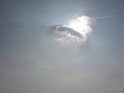 Osamělý mráček, který zakrývá Slunce nad Brodkem u Přerova, viděný od Strejčkova lomu zakončil fotografování na den svatého Řehoře L.P. 2010.
